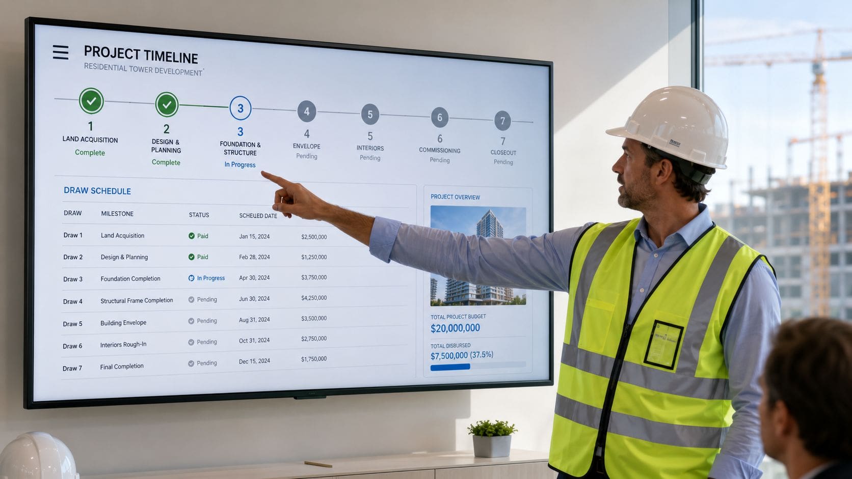 A construction manager in a hard hat and safety vest points at a digital project timeline display.